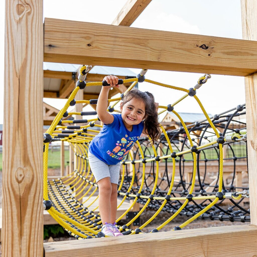 Child on a playground set.